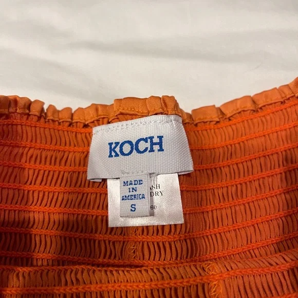 Koch Erica Skirt in Texas Tangerine. Size small. New with removed tag included.